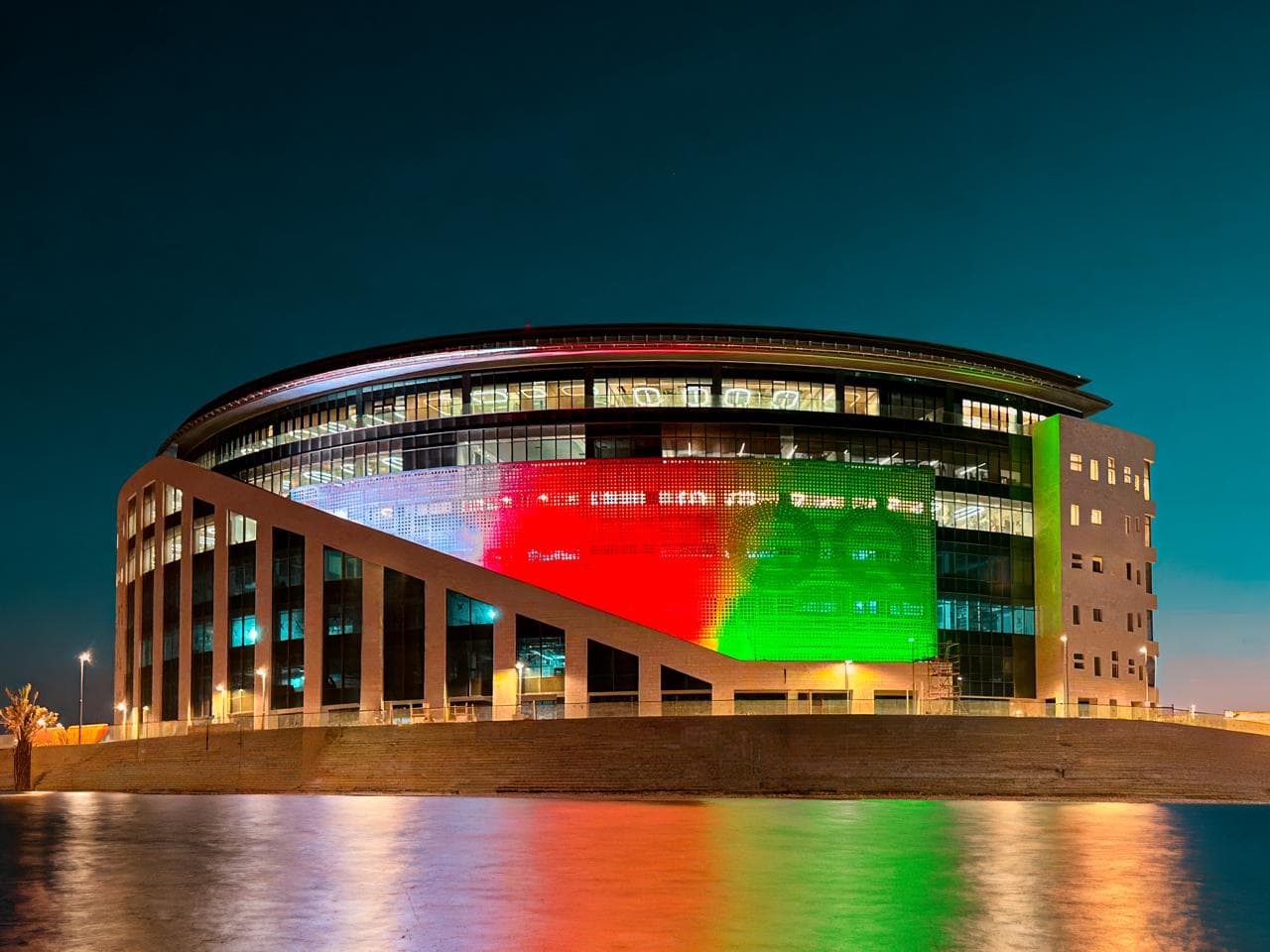 Colorfully illuminated Pearl REIF building